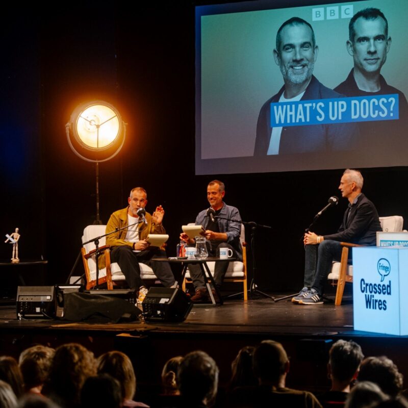 Drs Chris and Xand van Tulleken recording the Loftus Media / BBC Radio 4 podcast What's Up Docs? live at Crossed Wires Festival 2026 Photo by photographer Lindsay Melbourne